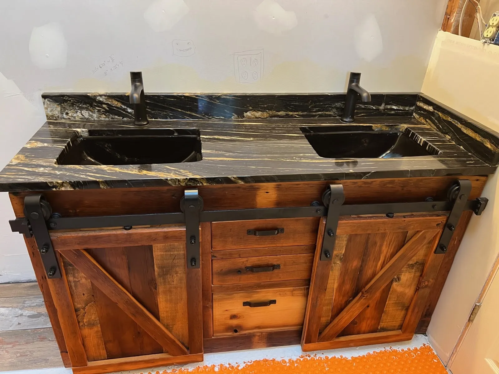 Dark stone on a rustic double vanity