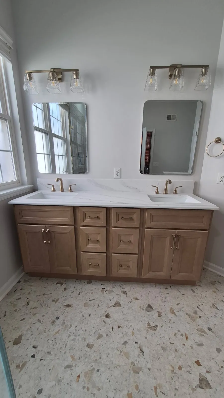 Vanity over terrazzo-look floor